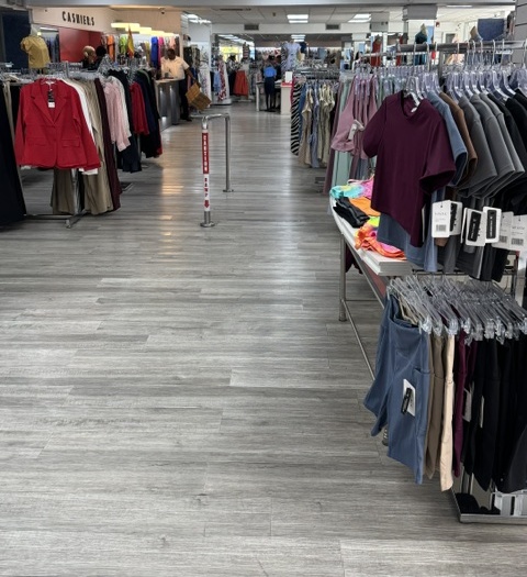 Wide selection of women's apparel on display racks