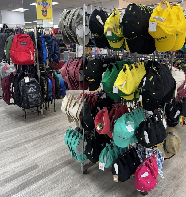 Caps, backpacks and Jamaica accessories display